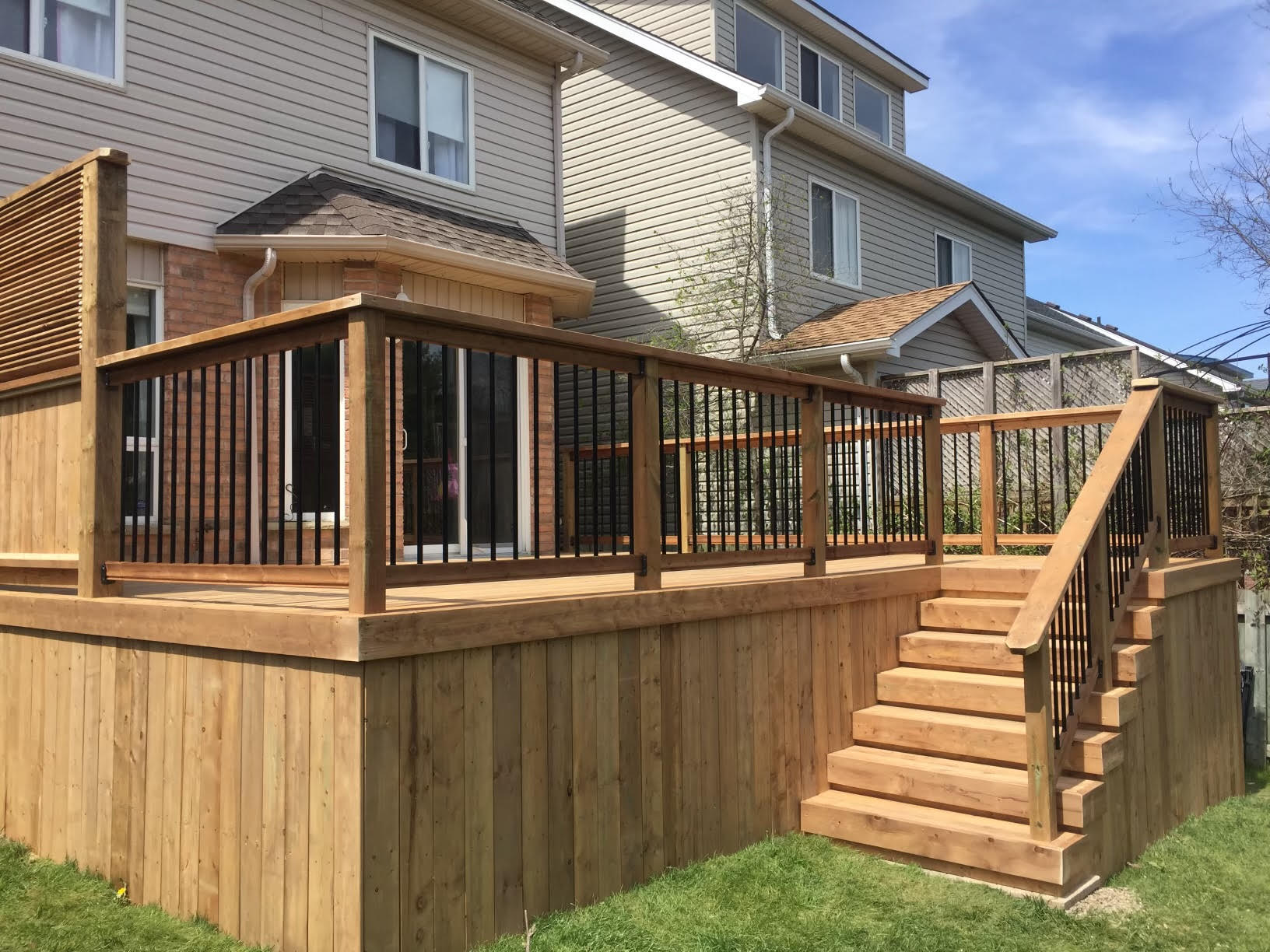 Custom cedar deck at sunset
